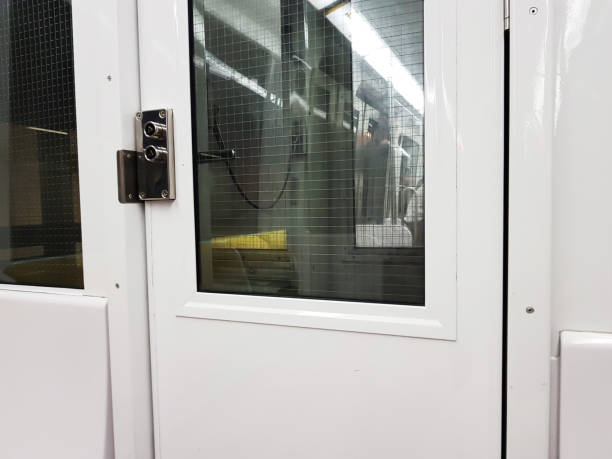 istock Glazed door crossing between subway cars 1163234611