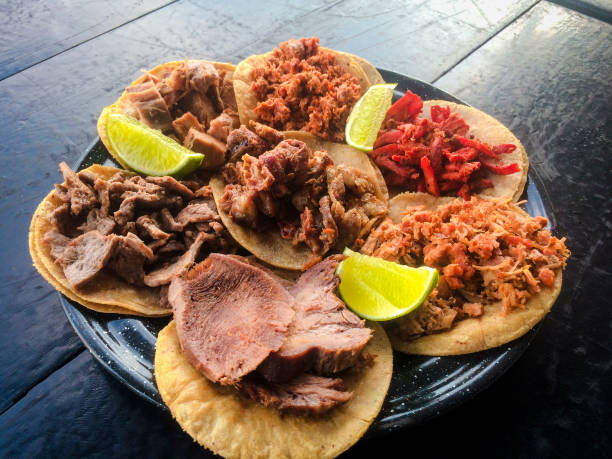 istock Real mexican tacos platter and lemon slices 1163237099