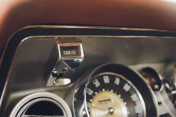istock Vintage car dashboard with chrome rims speedometer tachometer. speedometer tachometer 1163243534