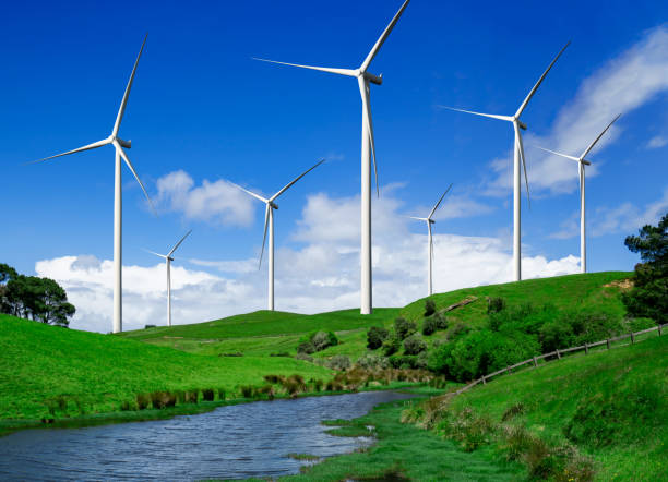 istock Wind turbine farm in beautiful nature landscape. 1163243734