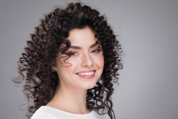 istock Woman with curly hair 1163245308