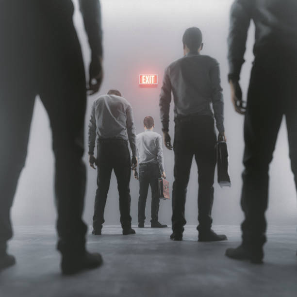 istock Tired businessmen trying to get out 1163249807