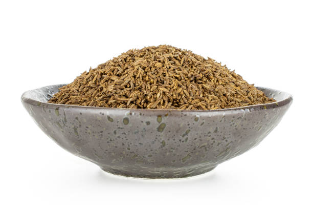 Dry caraway fruit isolated on white