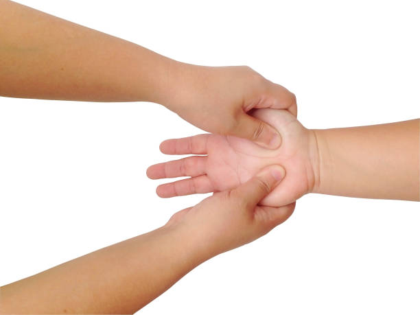 istock A massage therapist relaxes on customer hand. Massage therapy on white background. 1163260403