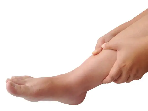 Injury to legs and feet. Foot and leg massage on white background.