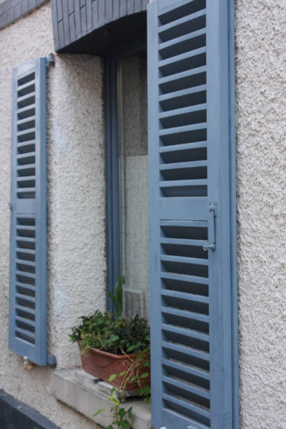 istock Wooden shutters of a window  Retro style 1163260511