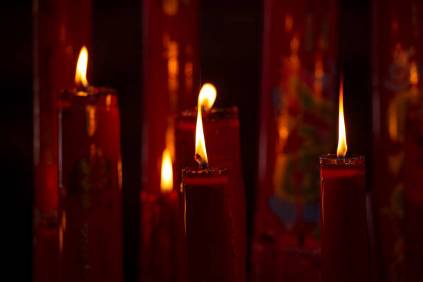 istock Candle light worship on black background 1163267872
