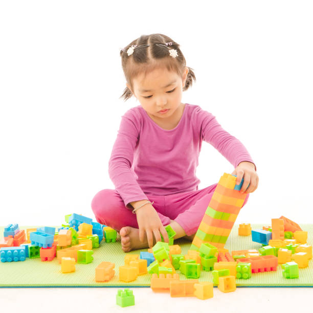 istock Little girl playing 1163268599
