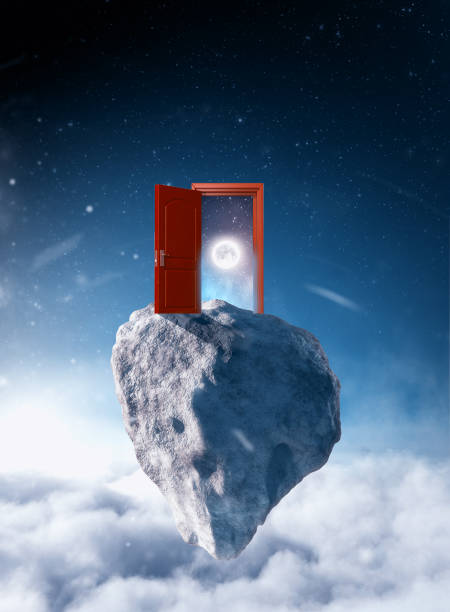 istock Opened door to moon in the space on a rock floating above clouds. 1163268697