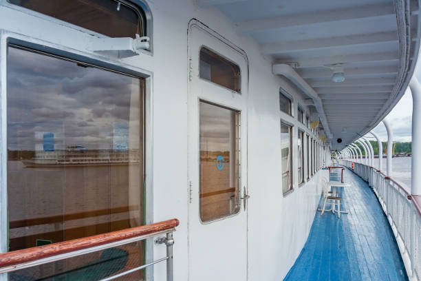 istock Deck of a ship with reflection of a passenger ship in the window 1163271714
