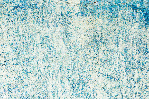 istock Texture of a concrete wall with cracks and scratches which can be used as a background 1163275057