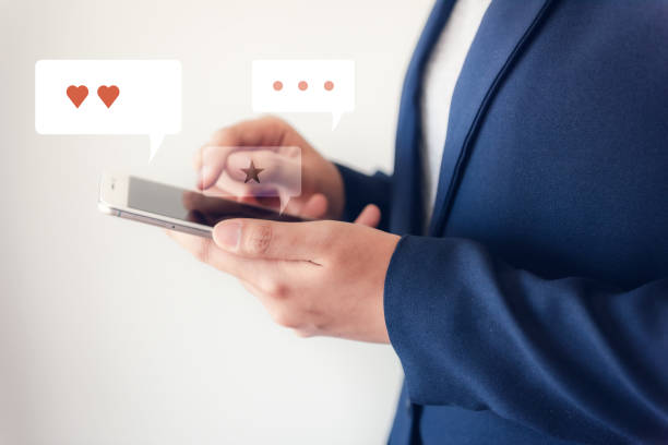 istock Mobile Application Smartphone and Communication Concept, Business Woman is Using Social Network on Cellphone With Multimedia Connecting Icons Design., Technology Entertainment and Creative Idea 1163281139