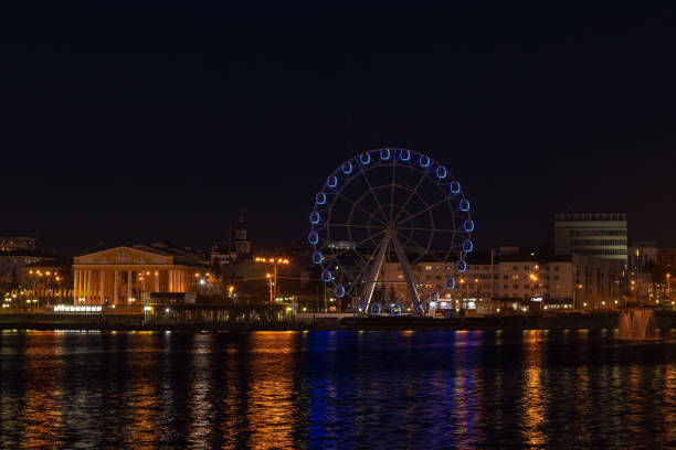 istock Lights evening Cheboksary with reflections in the water,shot on a summer evening 1163282766