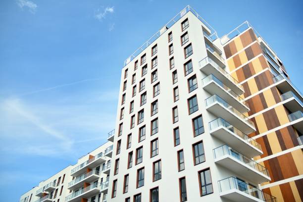 istock Multistory new modern apartment building. 1163284633