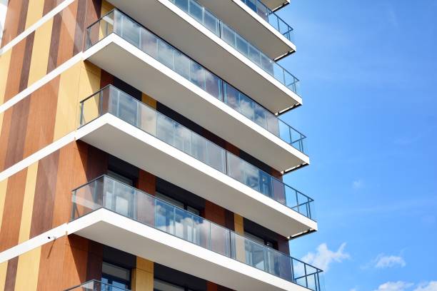 istock Multistory new modern apartment building. 1163284647