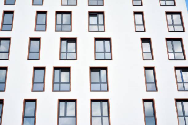 istock Multistory new modern apartment building. 1163284649