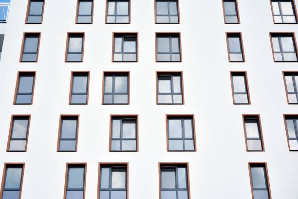 istock Multistory new modern apartment building. 1163284754