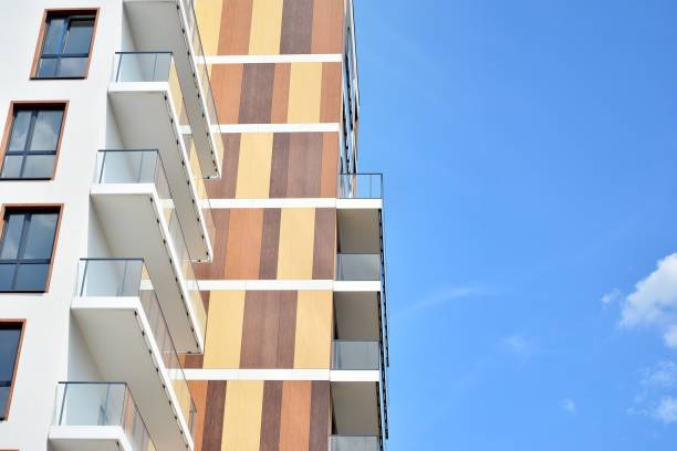 istock Multistory new modern apartment building. 1163284874