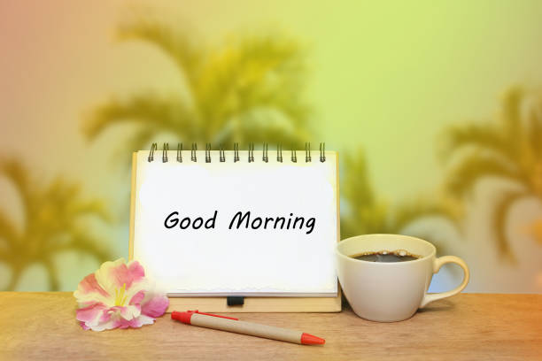 istock notepad and black coffee on blur palm tree and blue sky backgrou 1163287852