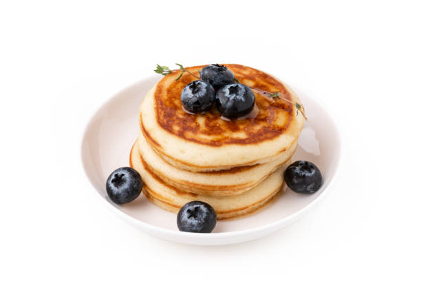 istock pancake with blue berry food on white background 1163289362