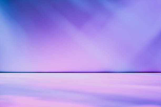 istock Artistic studio wall background in gradient tones of purple and blue 1163292671