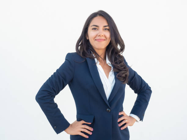 istock Proud confident business woman posing over white background 1163296785