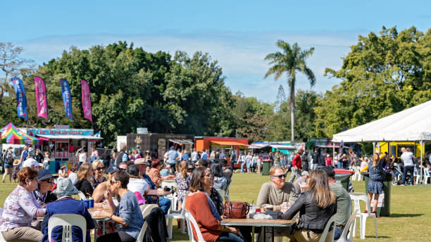 Crowd Of People Enjoying Outdoor Festival Mackay, Queensland, Australia - 20th July 2019: Crowd of people at city's annual outdoor food and wine festival food festival stock pictures, royalty-free photos & images