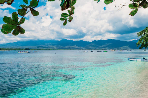istock Tropical ocean with boat in paradise island 1163300332