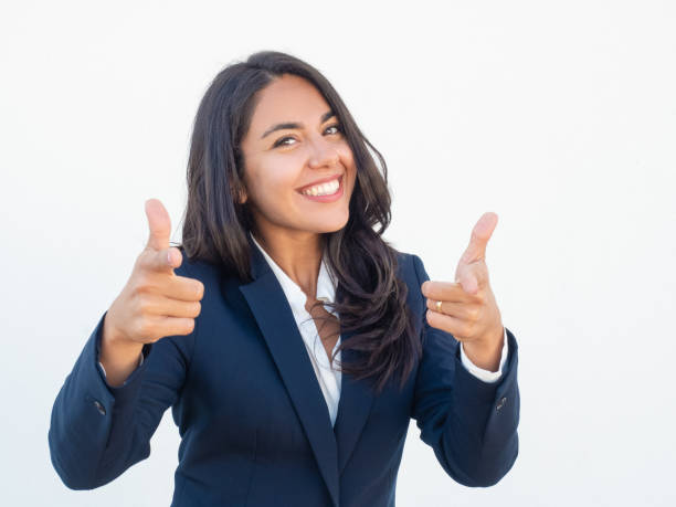 istock Happy excited business professional pointing fingers at camera 1163300442