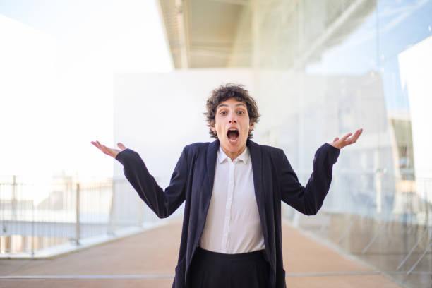 istock Surprised businesswoman looking at camera 1163301959
