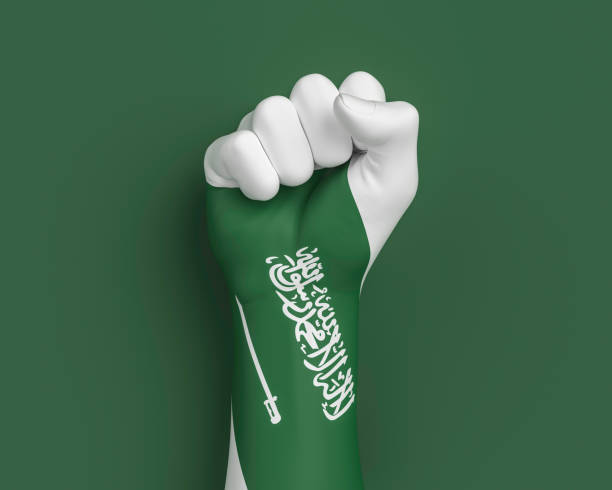 Saudi Arabia 23 September Independence day celebration background, national Saudi flag painted on hand fist. 3d illustration