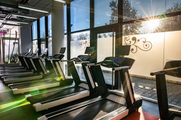 istock Large group of treadmills in a gym. 1163304507