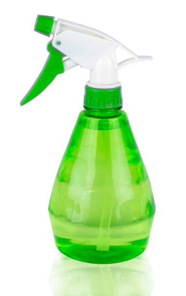 istock Green plastic spray witn water. Isolated on white background. Save with clipping path 1163305325