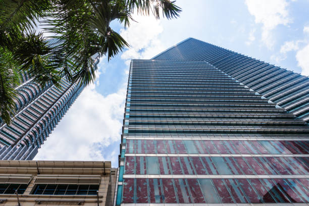 istock Glass building skyscraper with reflection. Business centre in downtown in Kuala Lumpur 1163306723