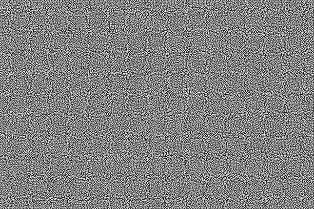 Vector illustration of Black and white grainy abstract background. Halftone - pointillism pattern with random dots.