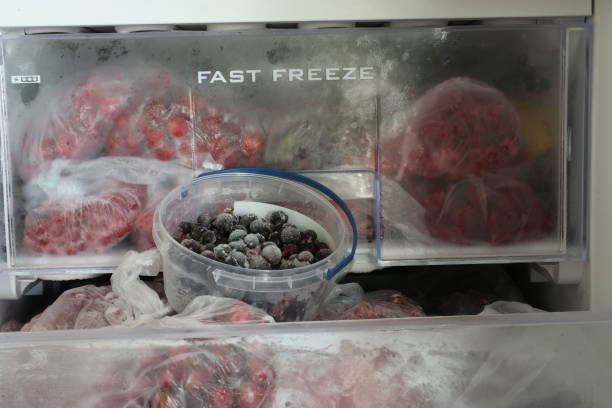 istock Frozen berries in the freezer. Inscription 