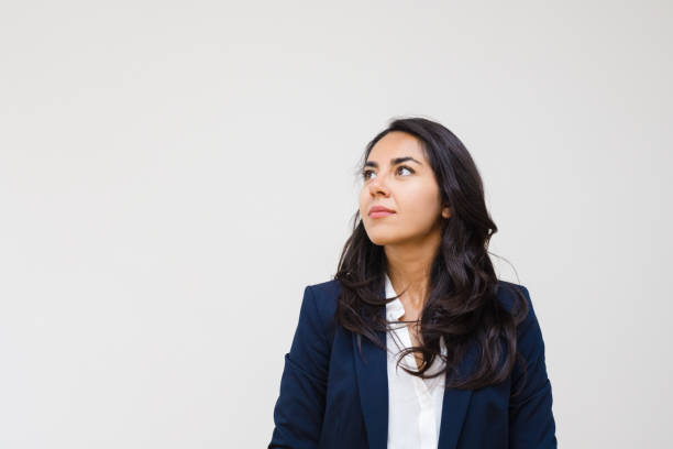 istock Pensive businesswoman looking away 1163311740