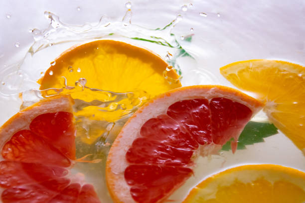 istock Fresh orange in a spray of water 1163314019