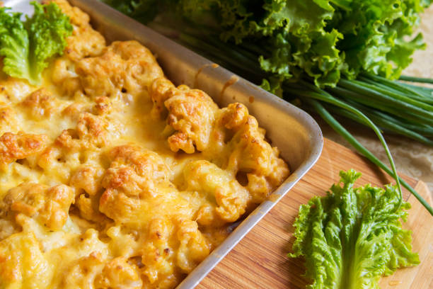 istock Cauliflower in batter under cheese crust on a tray 1163315015