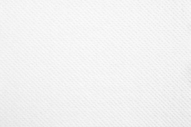 istock Closeup white blank paper napkin with rough surface texture background. 1163324603