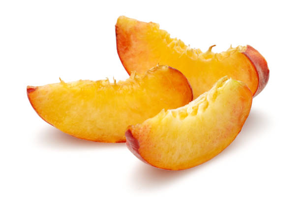 istock Ripe peach fruits isolated on white 1163327146