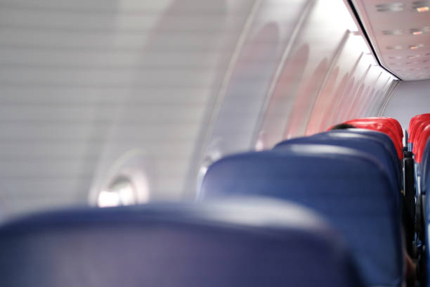 istock empty passenger seat inside airplane. chair in aircraft 1163327443