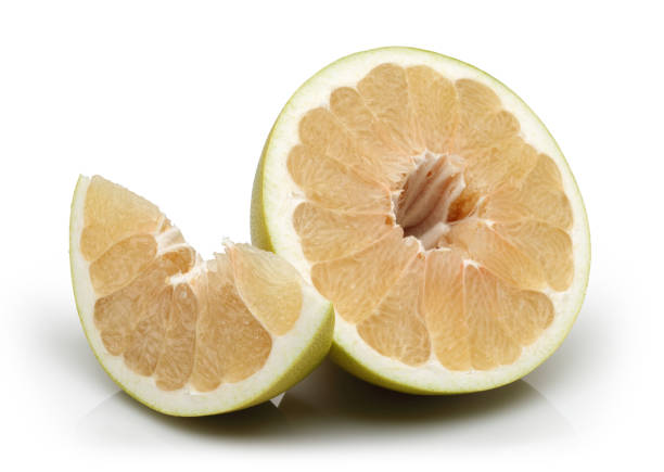 istock Fresh pomelo fruits isolated on white 1163328009