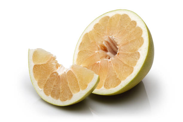 istock Fresh pomelo fruits isolated on white 1163328103