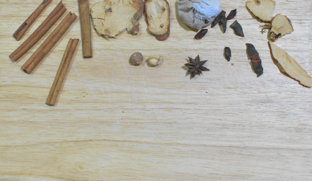 istock Dry spices on  wooden background 1163329387