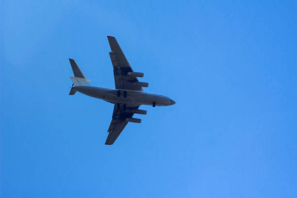istock big plane flying in the sky 1163329680
