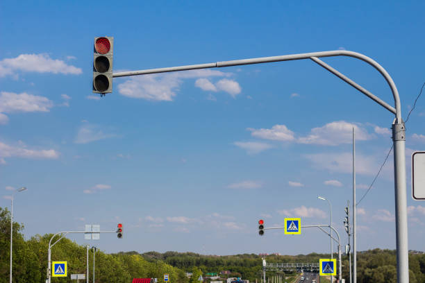 istock pedestrian crossing with traffic lights. 1163329742