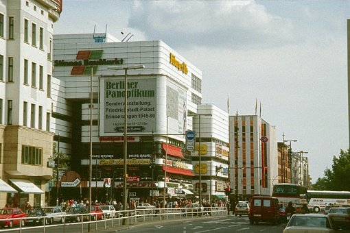 Berlin (West), Germany, 1977. The old Kudamm-Eck at Kurfürstendamm corner Joachimstaler Straße. Furthermore: traffic, pedestrians and shops.