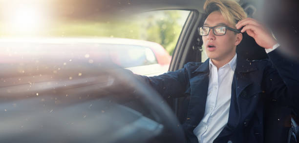 istock Man with car in the street 1163330633