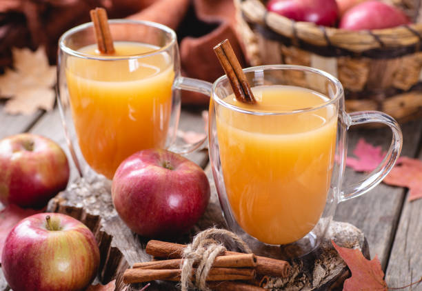 istock Glass of Apple Cider With Red Apples 1163330883